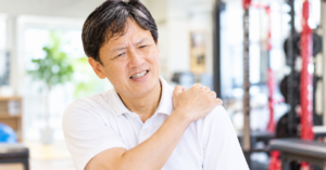肩こりに苦しむジム代表の画像